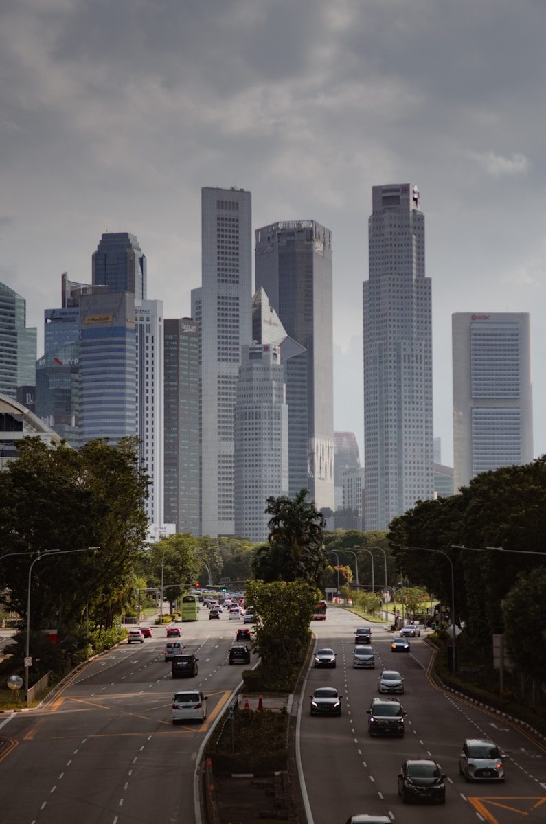 A view of a city with tall buildings in the background